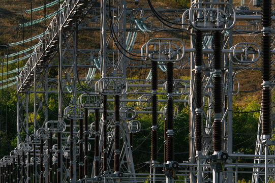 power station close-up against green hills