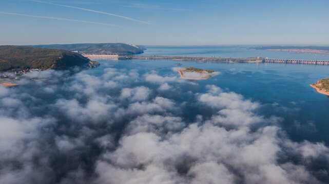 River hidden with fog on a sunny yet cold morning