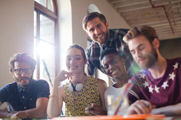 Creative business people brainstorming and working in office