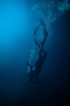 Snorkeling Diver In Deep Water 
