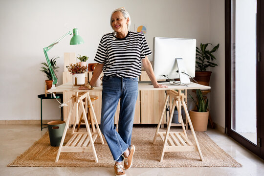 Senior woman standing at office