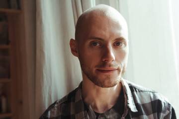 A violin artisan in his workshop.
