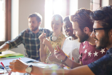 Creative business people brainstorming and working in office