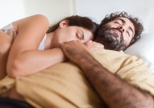 Portrait of a young couple sleeping
