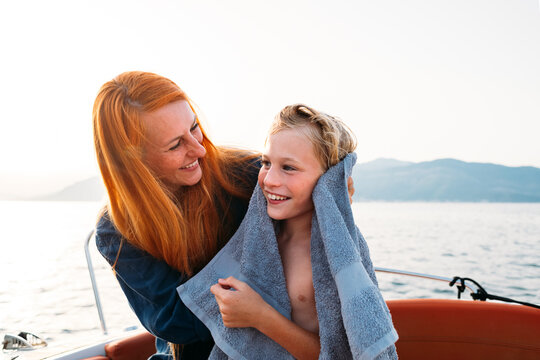 Woman and Her Son in Boat 