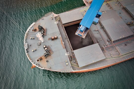 Narvik Norway iron ore ship loading minerals for export economy, aerial