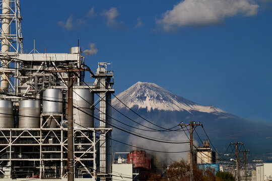 View of Mount Fuji and power plant in foreground