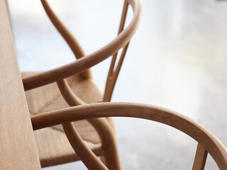Modern wooden chairs at table