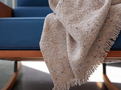 Wool plaid on blue armchair