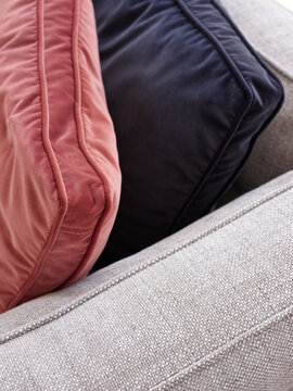Velvet cushions on sofa
