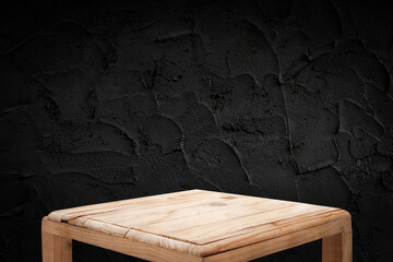 Wood table and black wall background, Empty wooden floor space platform with library background for product display.