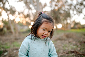 Young Asian girl outdoors