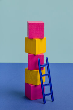 Сolorful wooden blocks with colored stairs
