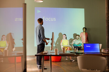 Obraz na płótnie Canvas Business people preparing audio visual presentation on Focus