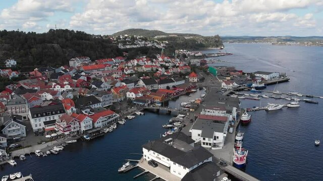 Quaint coastal town of Kragero, with stunning marina; Norway, drone flight