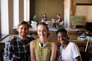 Portrait smiling creative business people in meeting