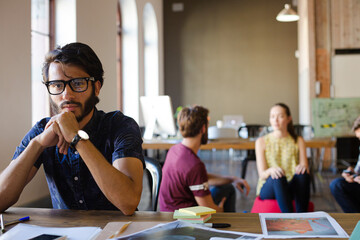 Portrait confident casual businessman in sunny office