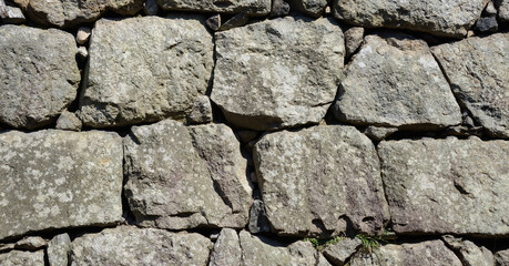 Ancient old stone wall that always looks solid and beautiful.