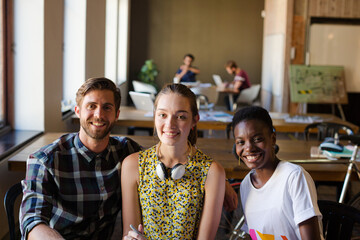 Portrait smiling creative business people in meeting