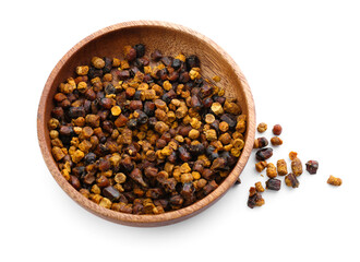 Plate with beebread on white background