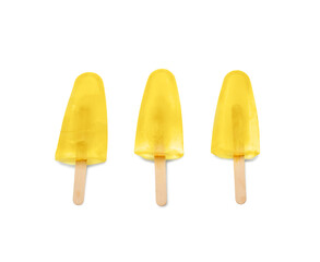 Tasty pineapple popsicles on white background