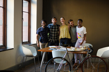 Portrait creative business people working in office