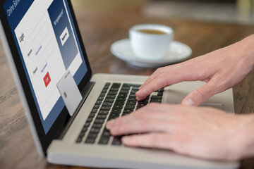 Close up picture of somebody paying online by card