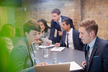 Business people talking in conference room meeting