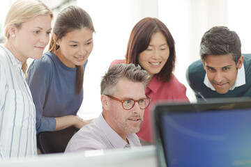 Business people working at computer in office