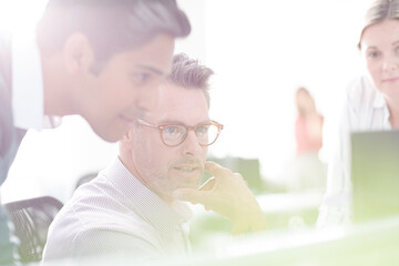 Fototapeta premium Business people working at computer in office