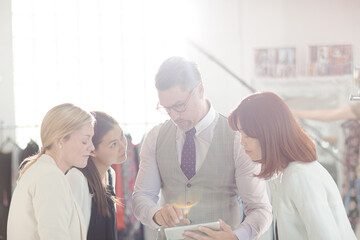 Fashion designers brainstorming in office