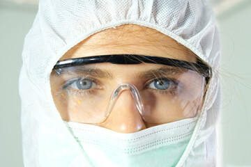 Doctor wearing protective clothing from coronavirus, medical concept