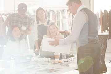 Fototapeta premium Fashion designers meeting in sunny office