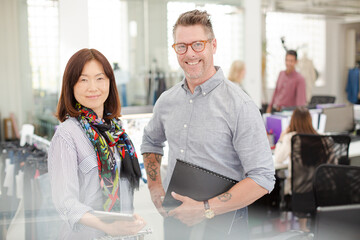 Fototapeta premium Portrait smiling fashion designers in office