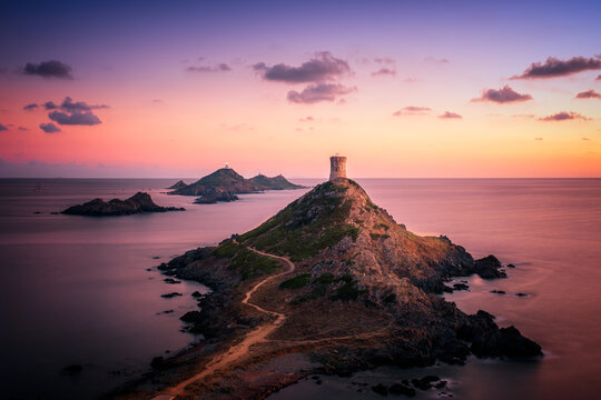 Sunset over the Genoese tower and lighthouse at Pointe de la Parata and Les Iles Sanguinaires near Ajaccio in Corsica
