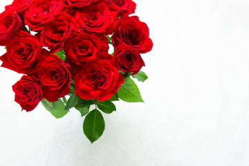 photo of a bouquet of red roses with a copy space on the right.
