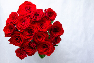photo of a bouquet of red roses with a copy space on the right.