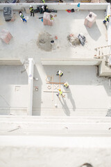 Overhead view of construction workers at construction site