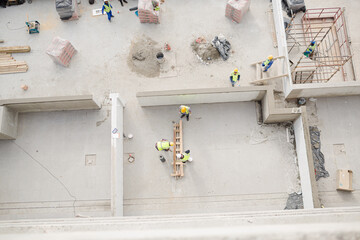 Overhead view of construction workers at construction site