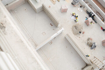 Overhead view of construction workers at construction site