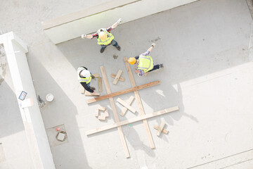 Overhead view of construction workers at construction site