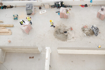 Overhead view of construction workers at construction site