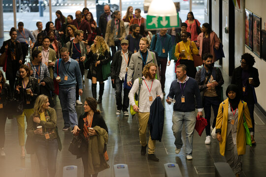 People arriving at  conference