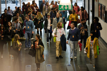 People arriving at  conference