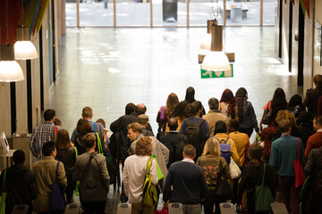 People leaving conference hall