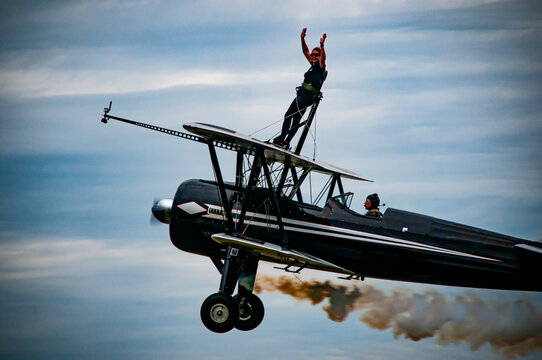 Wing Walking on Top of a Biplane