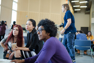 People drinking coffee during conference break