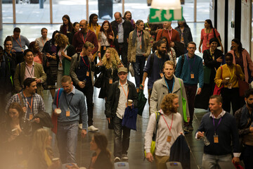 People arriving at  conference