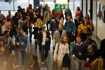 People arriving at  conference