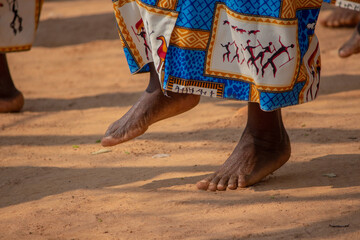 Woman doing traditional dances barefoot